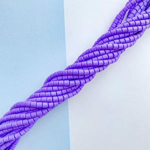 
                
                    Load image into Gallery viewer, 6mm Purple Polymer Clay Barrel Strand
                
            
