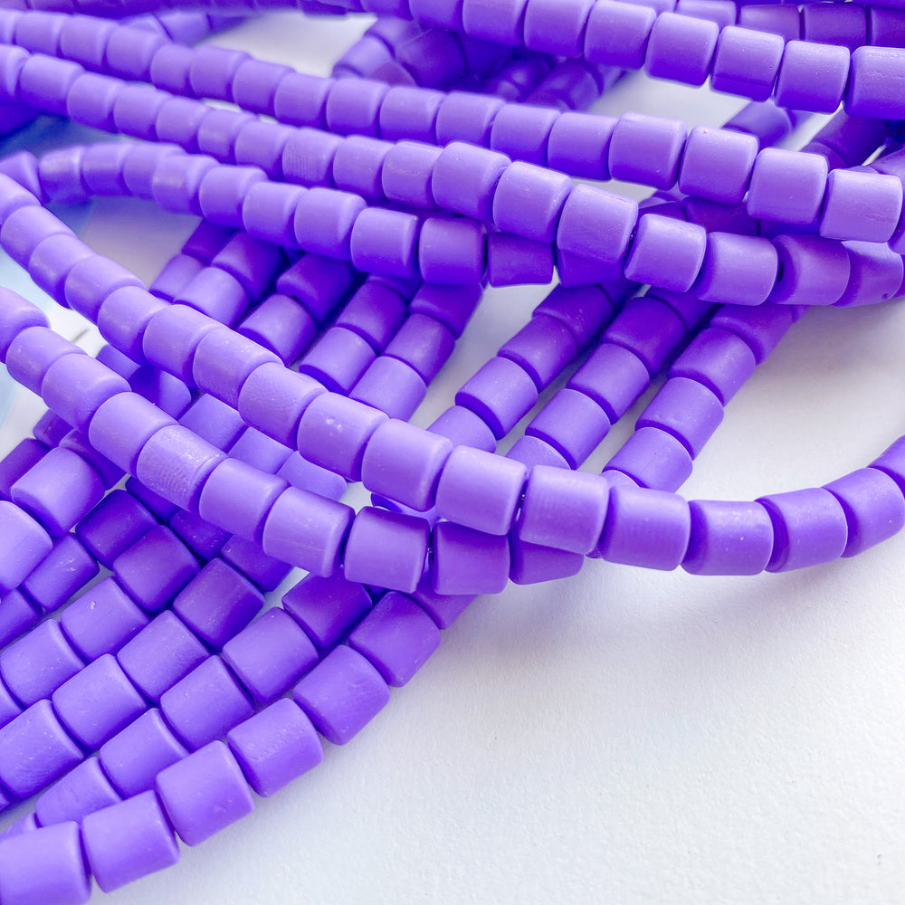 
                
                    Load image into Gallery viewer, 6mm Purple Polymer Clay Barrel Strand
                
            