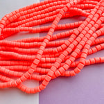 6mm Neon Coral Polymer Clay Barrel Strand