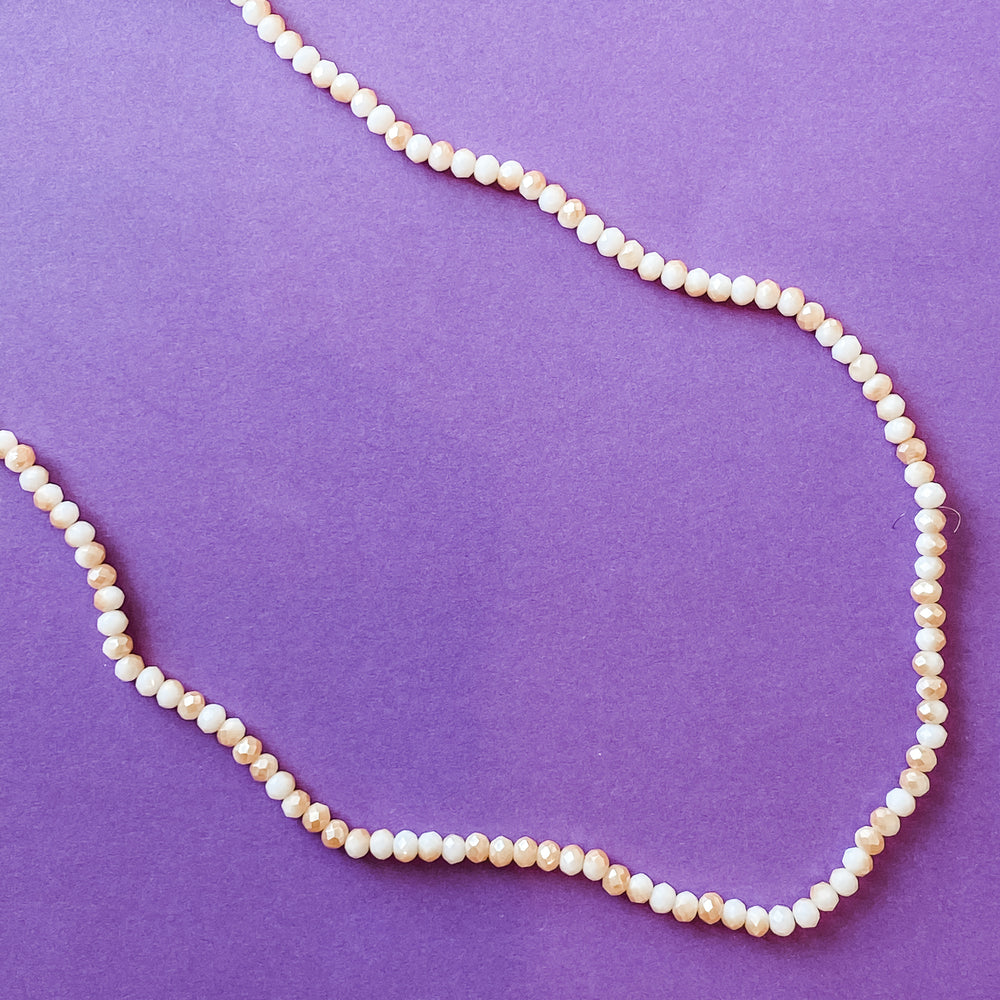 
                
                    Load image into Gallery viewer, 4mm Two-Tone Blush And Caramel Crystal Rondelle Strand
                
            