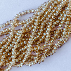 
                
                    Load image into Gallery viewer, 6mm Diamond Finish Honey Crystal Rondelle Strand
                
            