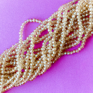 
                
                    Load image into Gallery viewer, 4mm Diamond Finish Honey Crystal Rondelle Strand
                
            