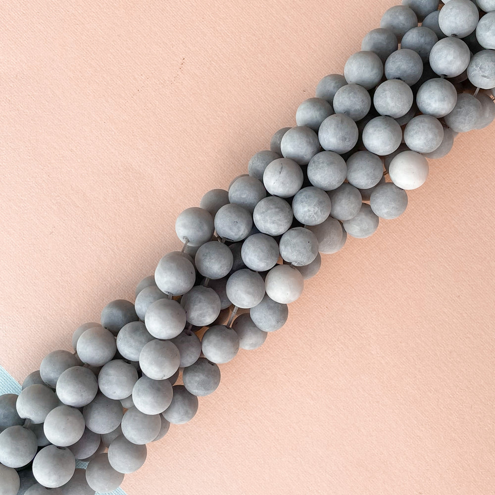 
                
                    Load image into Gallery viewer, 8mm Matte Light Slate Dyed Jade Rounds Strand
                
            