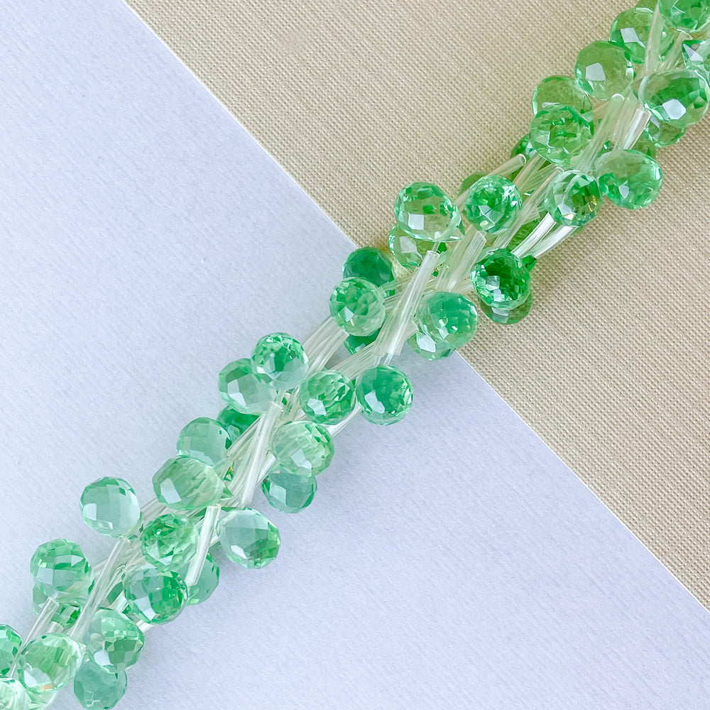6mm Green Glass Faceted Briolette Strand