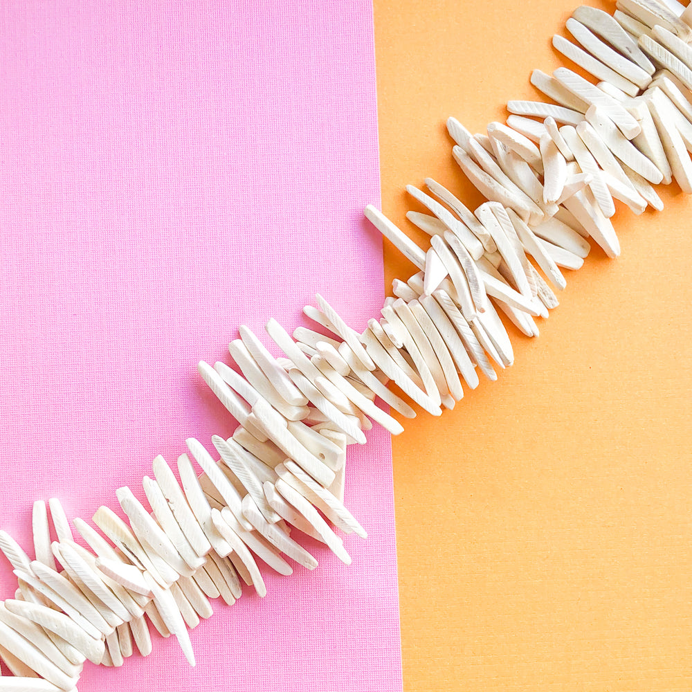 25mm White Wood Spikes Strand