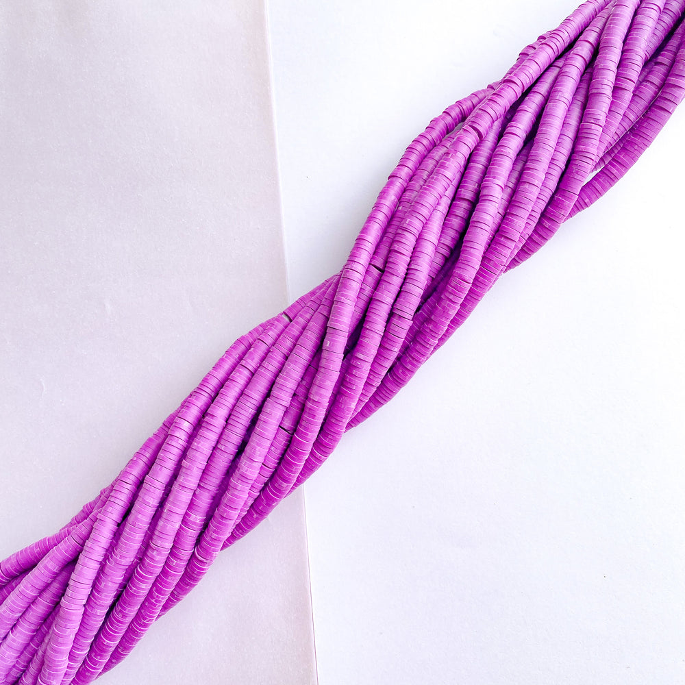 
                
                    Load image into Gallery viewer, 6mm Plum Polymer Clay Heishi Strand
                
            