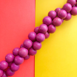 16mm Magenta Wood Rounds Strand - Beads, Inc.