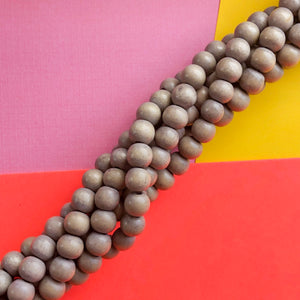 8mm Light Gray Wood Rounds Strand - Beads, Inc.