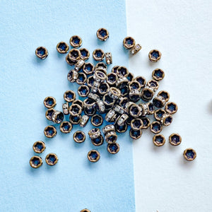 
                
                    Load image into Gallery viewer, 4mm Rhinestone Crystal Rondelle Matte Antique Bronze - 100 Pack
                
            