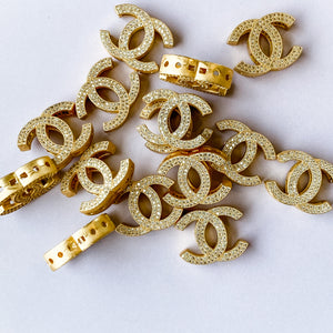 
                
                    Load image into Gallery viewer, 19mm Brushed Gold Pave Interlocking C Bead
                
            