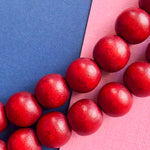 10mm Cranberry Wood Rounds Strand - Beads, Inc.