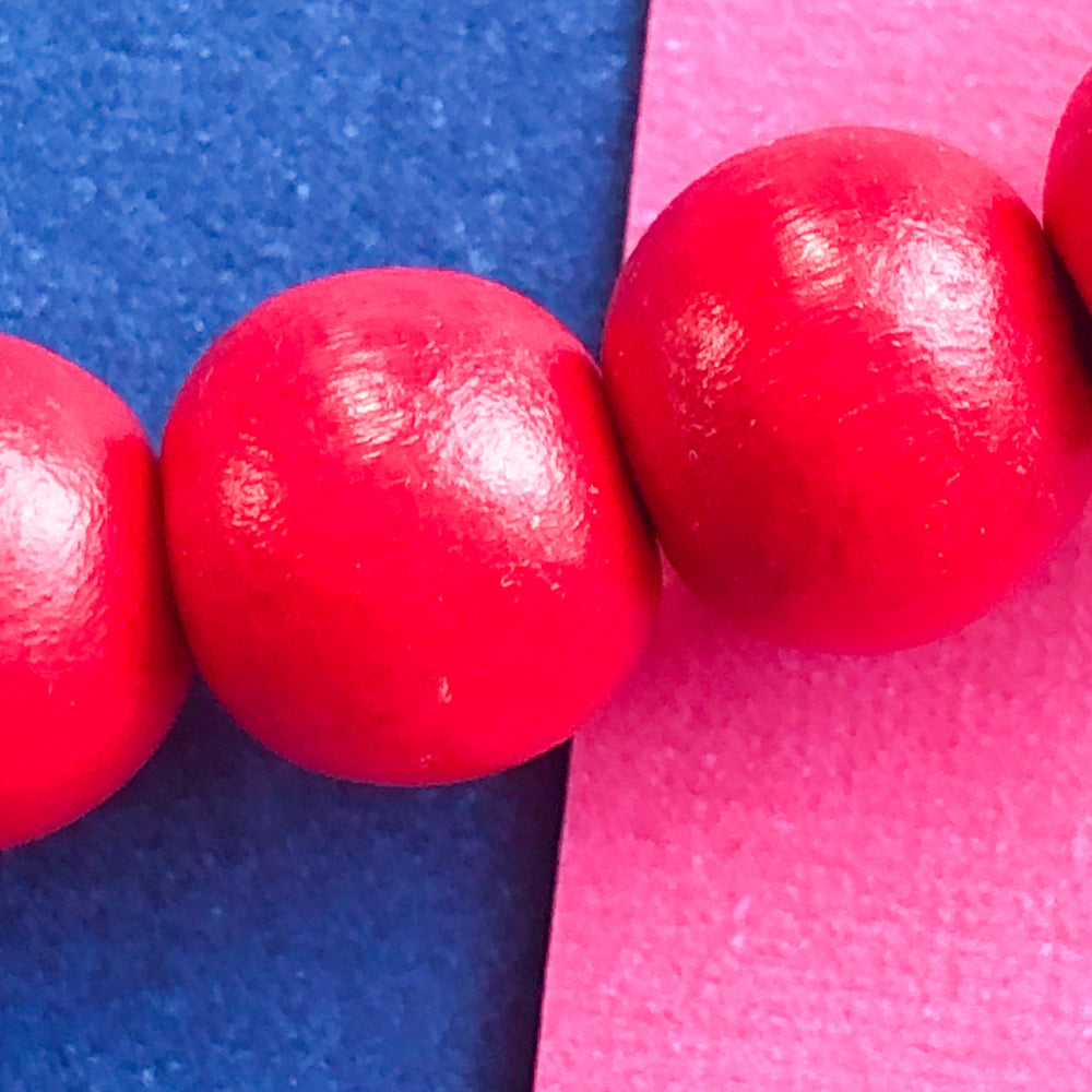 10mm True Red Wood Rounds Strand - Beads, Inc.