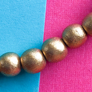 6mm Gold Wood Rounds Strand - Beads, Inc.