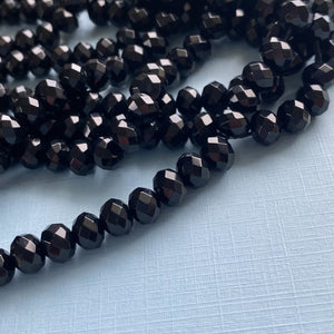 
                
                    Load image into Gallery viewer, 8mm Black Dyed Jade Faceted Rondelle Strand
                
            