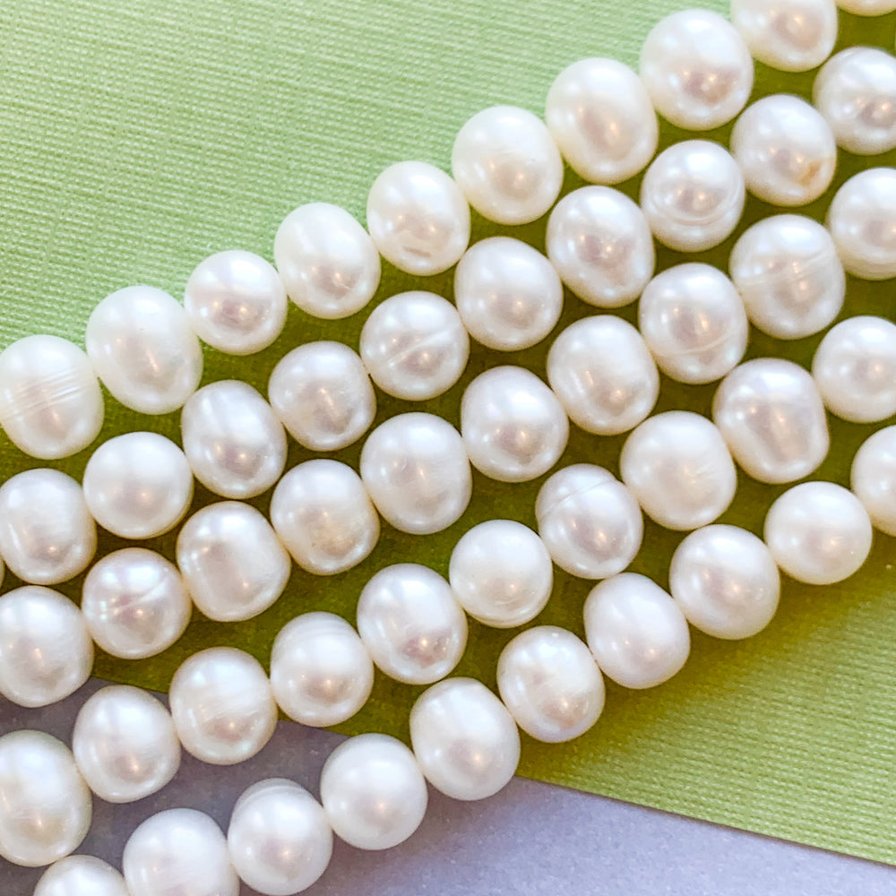 7-9mm White Freshwater Pearl Rounds Strand